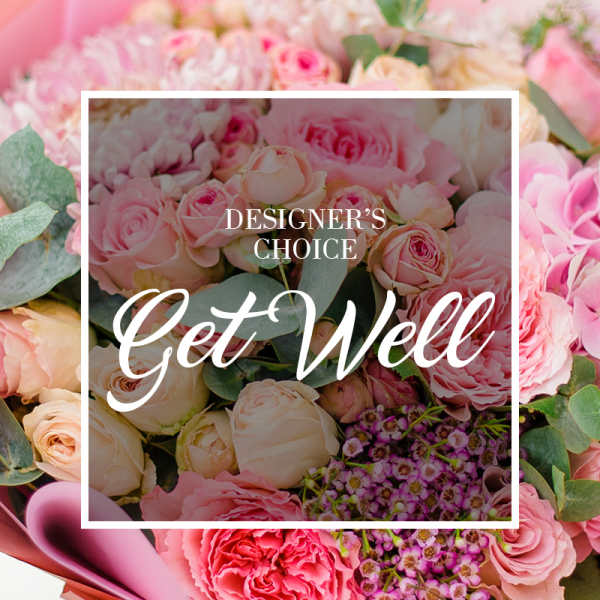 Pink and cream roses with greenery and "Get Well" text