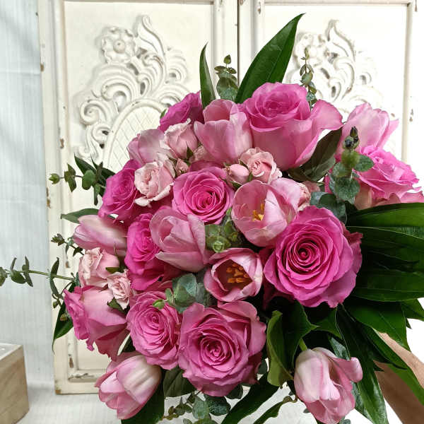 Pink rose and tulip bouquet with eucalyptus greenery