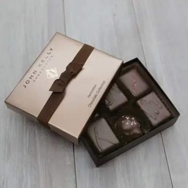 Box of assorted chocolates with a ribbon