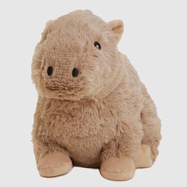 Plush hippo toy in tan fur on a white background