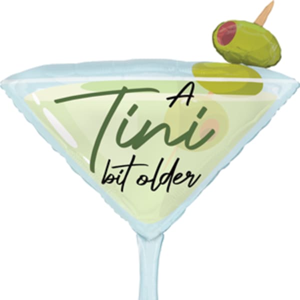 Martini glass-shaped balloon with an olive topper and "A Tini bit older" text
