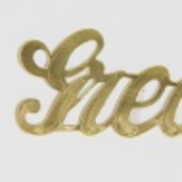 Gold script word "Sweet" on a white background