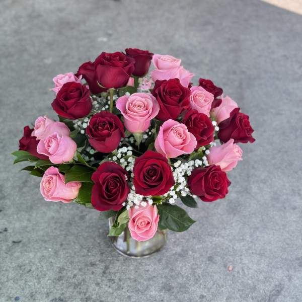 Beautiful red and pink roses in a vase