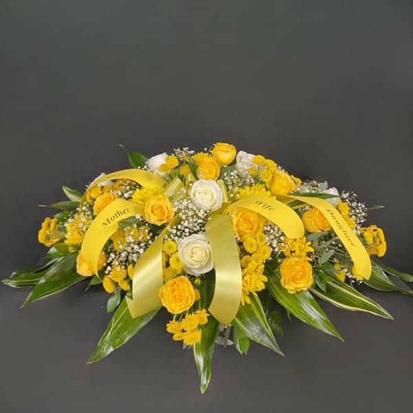 Golden Road Casket Spray
