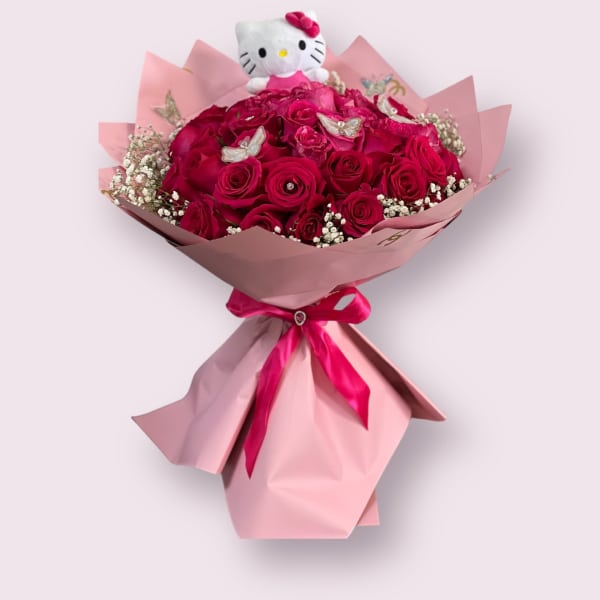 Bouquet of hot pink roses with a Hello Kitty topper and pink wrapping