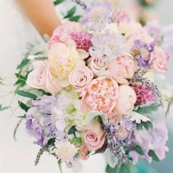 Pastel bouquet of roses, peonies, and lavender flowers