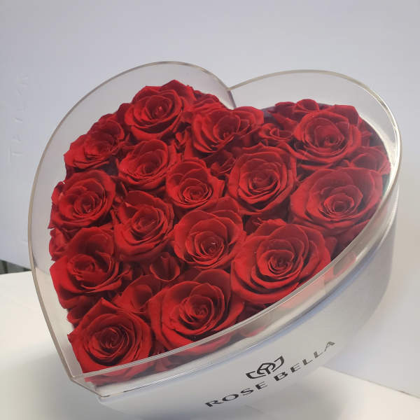 Heart-shaped box filled with red roses