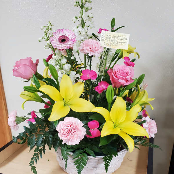 White Wicker Basket with Assortment of Flowers