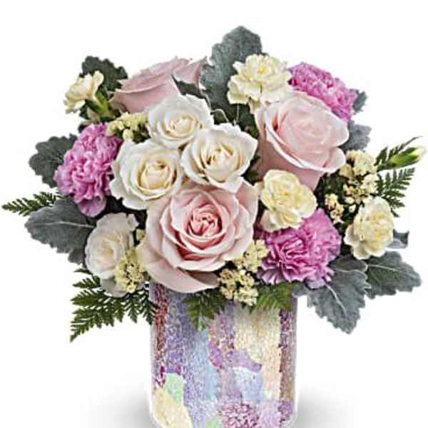 Pink and white rose bouquet in a pastel mosaic vase