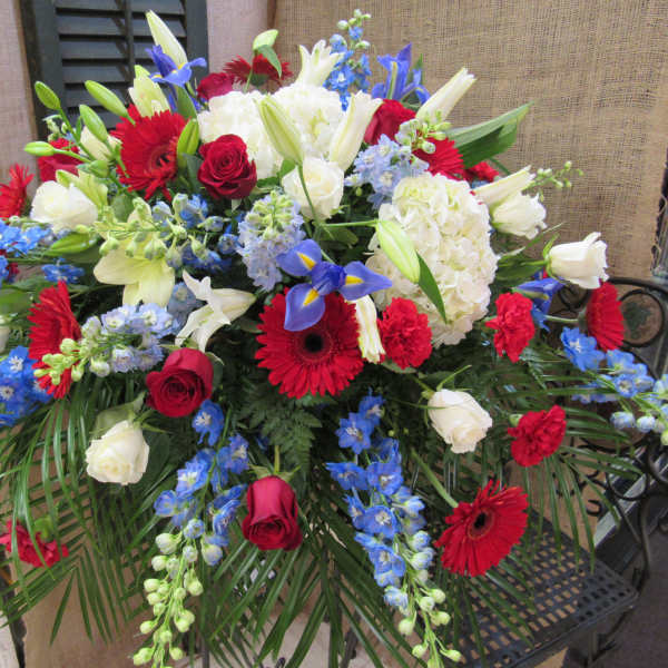 Large mixed bouquet with red, white, and blue flowers