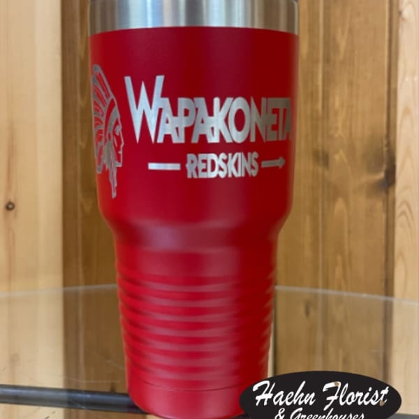 Red insulated tumbler with silver lid and printed logo