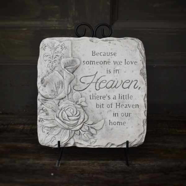 Decorative memorial plaque with roses and a sympathy quote