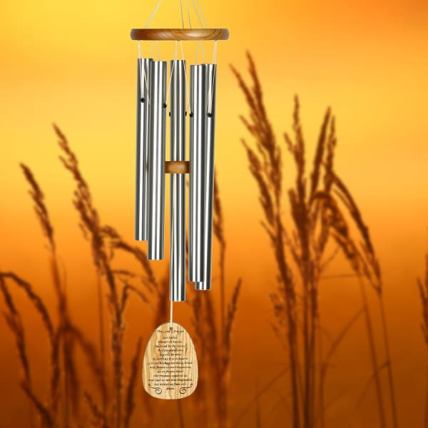 Silver wind chime with a wooden top and engraved pendant