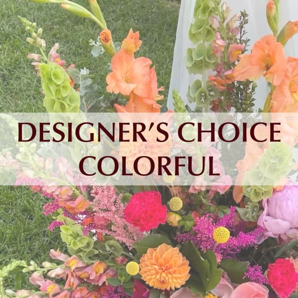 Colorful mixed bouquet with orange, pink, purple, and green flowers