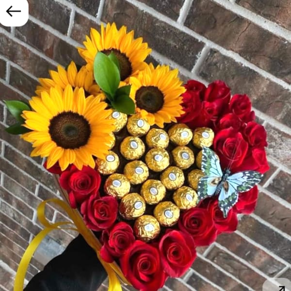 Heart-shaped bouquet of red roses, sunflowers, and gold-wrapped chocolates