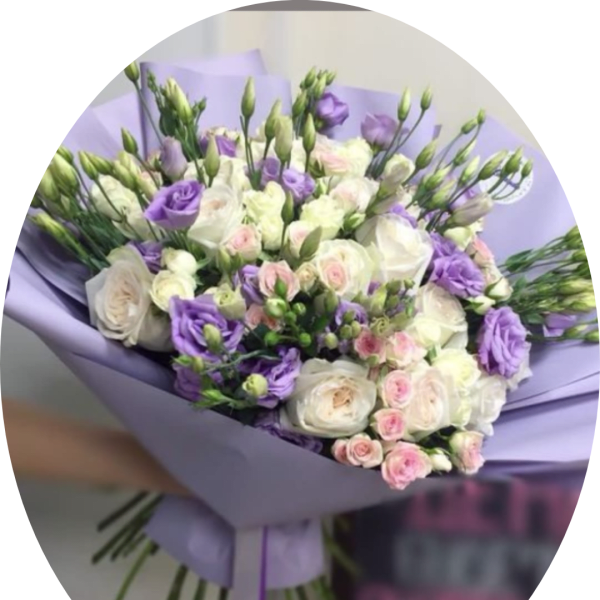 Lavender-wrapped bouquet of white and purple flowers