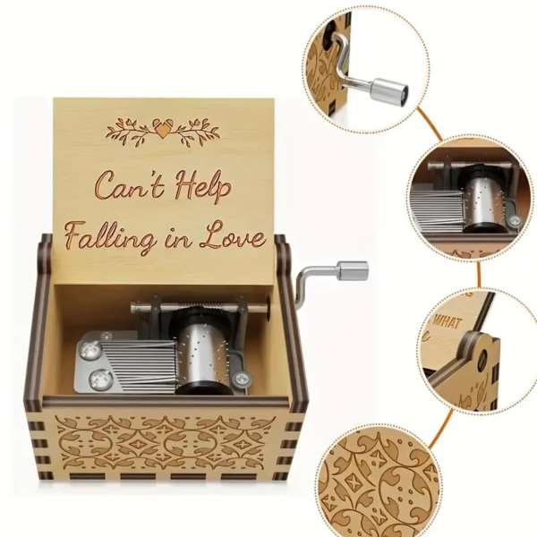 Wooden music box with engraved "Can't Help Falling in Love" text