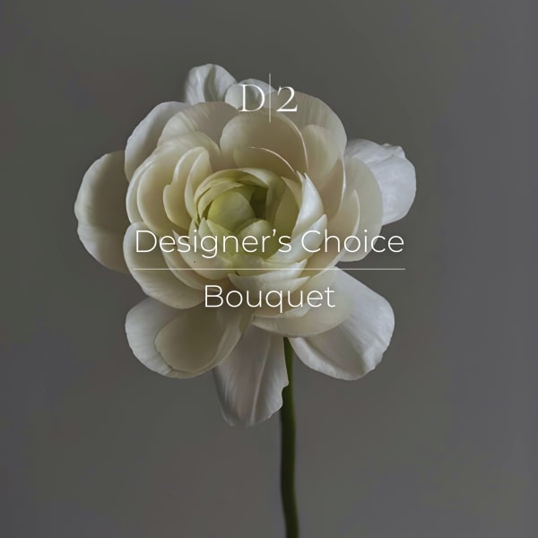 Single white flower labeled Designer's Choice Bouquet
