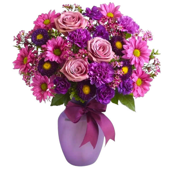 Pink and purple bouquet in a lavender vase with a ribbon