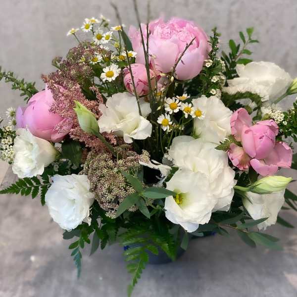 Pink and white bouquet with peonies and small daisy flowers