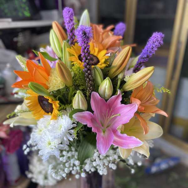 Beautiful Mix of Lilys and sunflowers plus other flowers