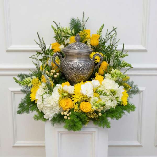Yellow sympathy urn arrangement