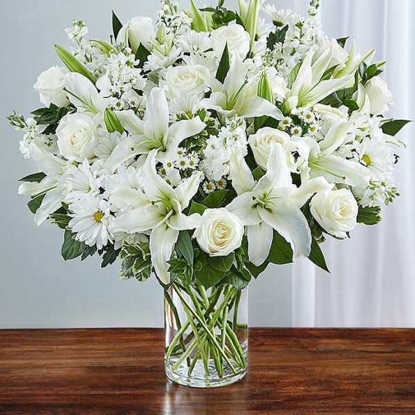 Sympathy white flowers on the vase