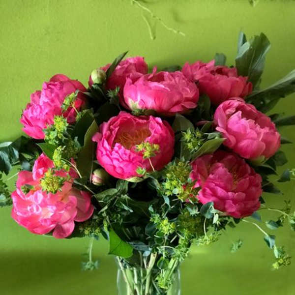 Pink peony bouquet in a clear glass vase