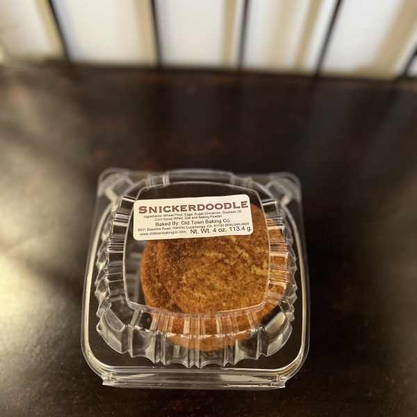 Packaged snickerdoodle pastry in a clear plastic clamshell