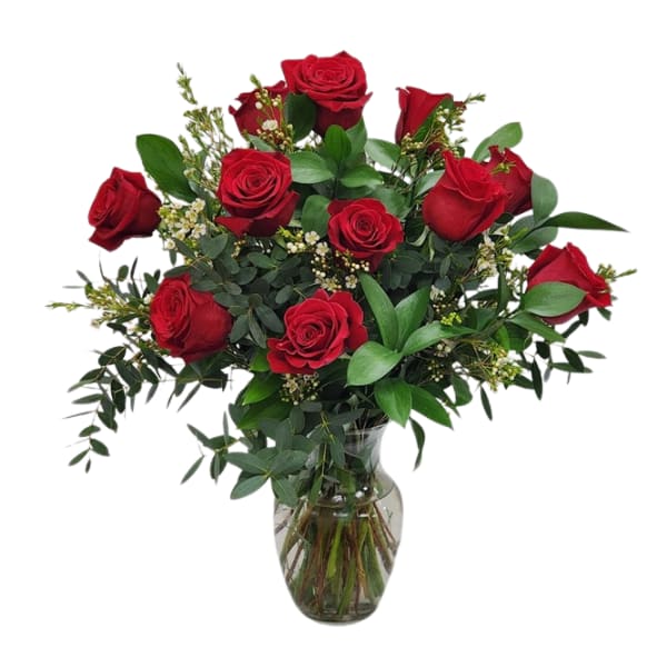 Bouquet of red roses in a clear glass vase
