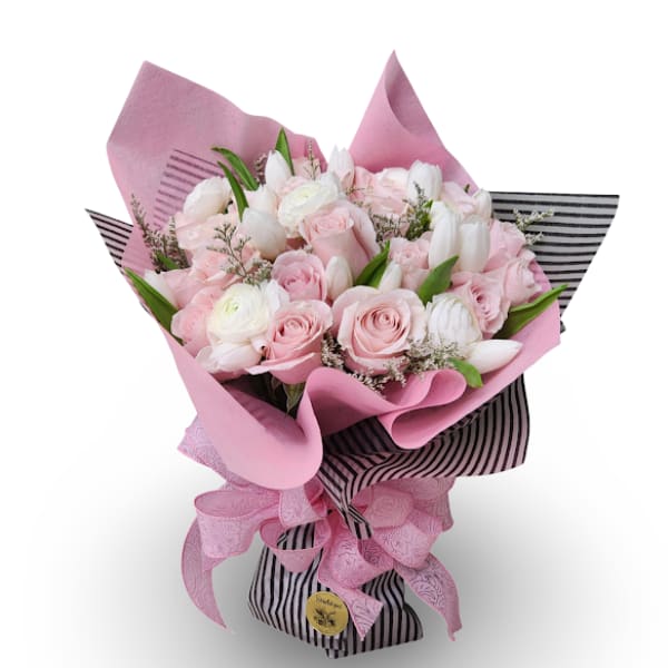 Pink and white bouquet of roses and tulips wrapped in striped paper