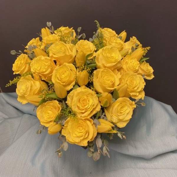 Bouquet of yellow roses and tulips