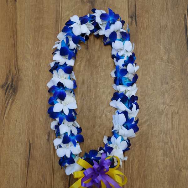 Blue and white flower lei with a purple and yellow ribbon bow