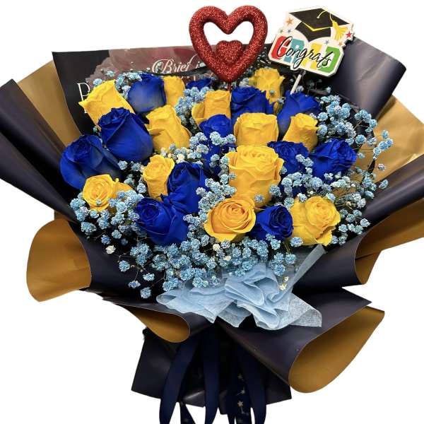 Bouquet of blue and yellow roses with a congrats topper