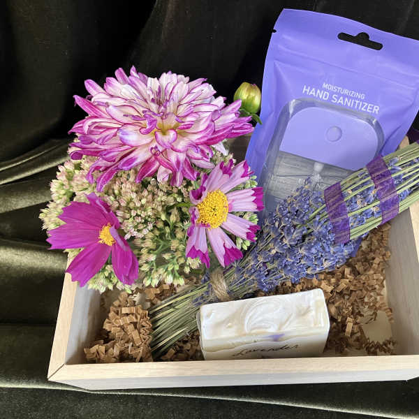 Gift box with mixed flowers, lavender bundle, soap, and hand sanitizer