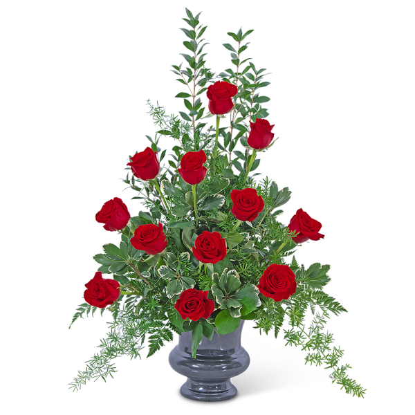 Tall arrangement of red roses in a gray vase