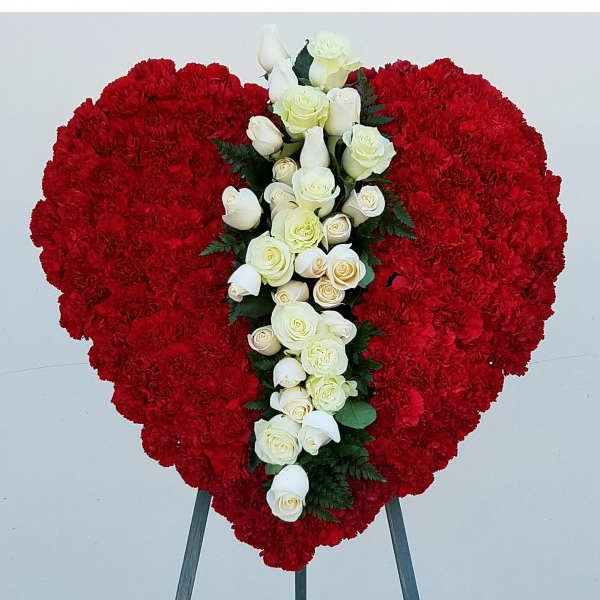 Heart-shaped red floral spray with white roses and calla lilies