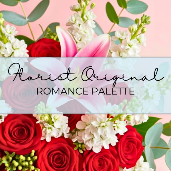 Red roses and white flowers with pink lilies on a soft pink background