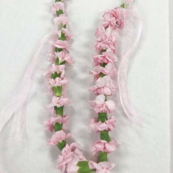 Pink flower lei with sheer ribbon streamers