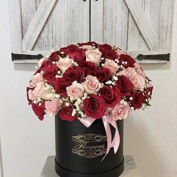 Romance in Bloom” Rose Hatbox Arrangement