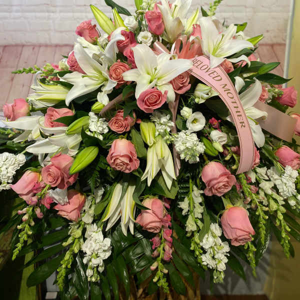 Large pink and white floral spray with lilies and roses