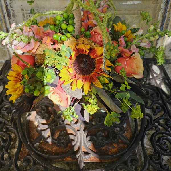 Mixed bouquet with sunflowers and peach roses