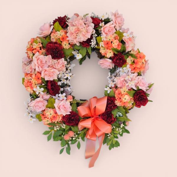 “Blossom Embrace Wreath” by Art and Flowers
