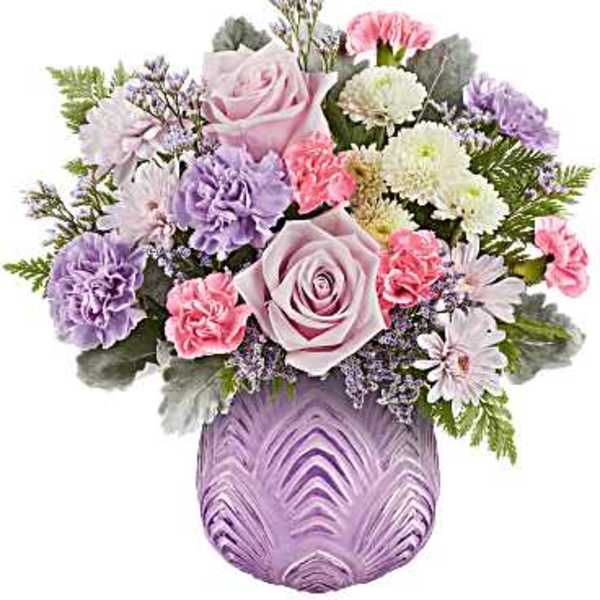 Pink and lavender bouquet in a purple vase