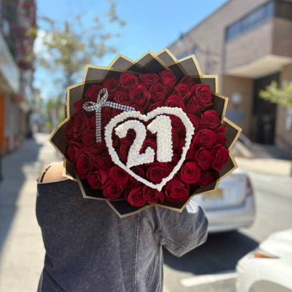 Bouquet of red roses with a white heart and "21" decoration