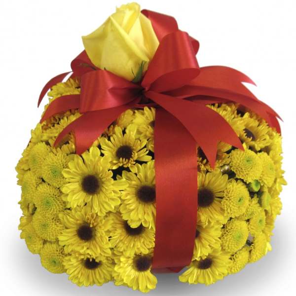 Yellow daisy bouquet wrapped with a red ribbon and topped with a yellow rose