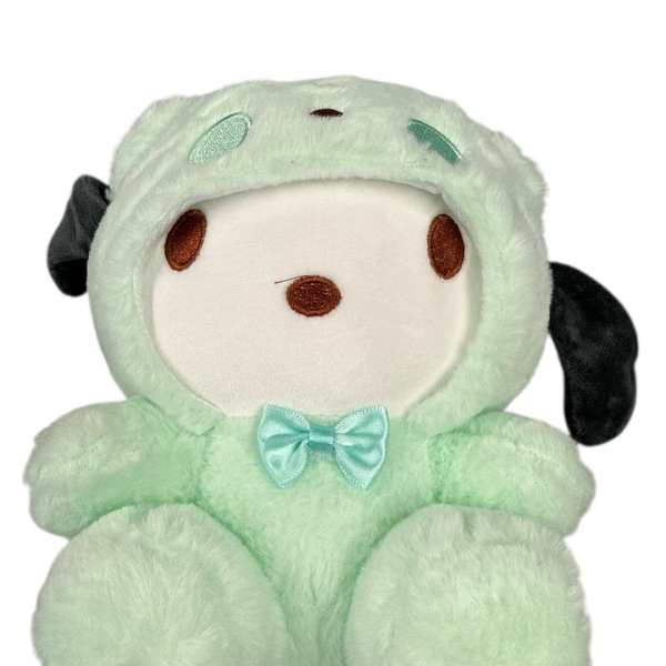 Mint green plush dog with a blue bow