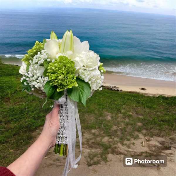 White and green bridal bouquet with lilies and hydrangeas