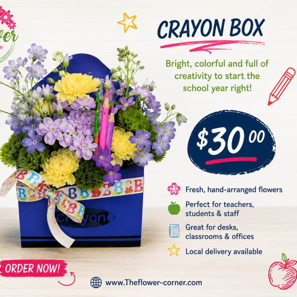 Blue crayon box arrangement with purple and yellow flowers and a ribbon