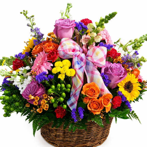 Colorful mixed flower basket with a plaid ribbon bow